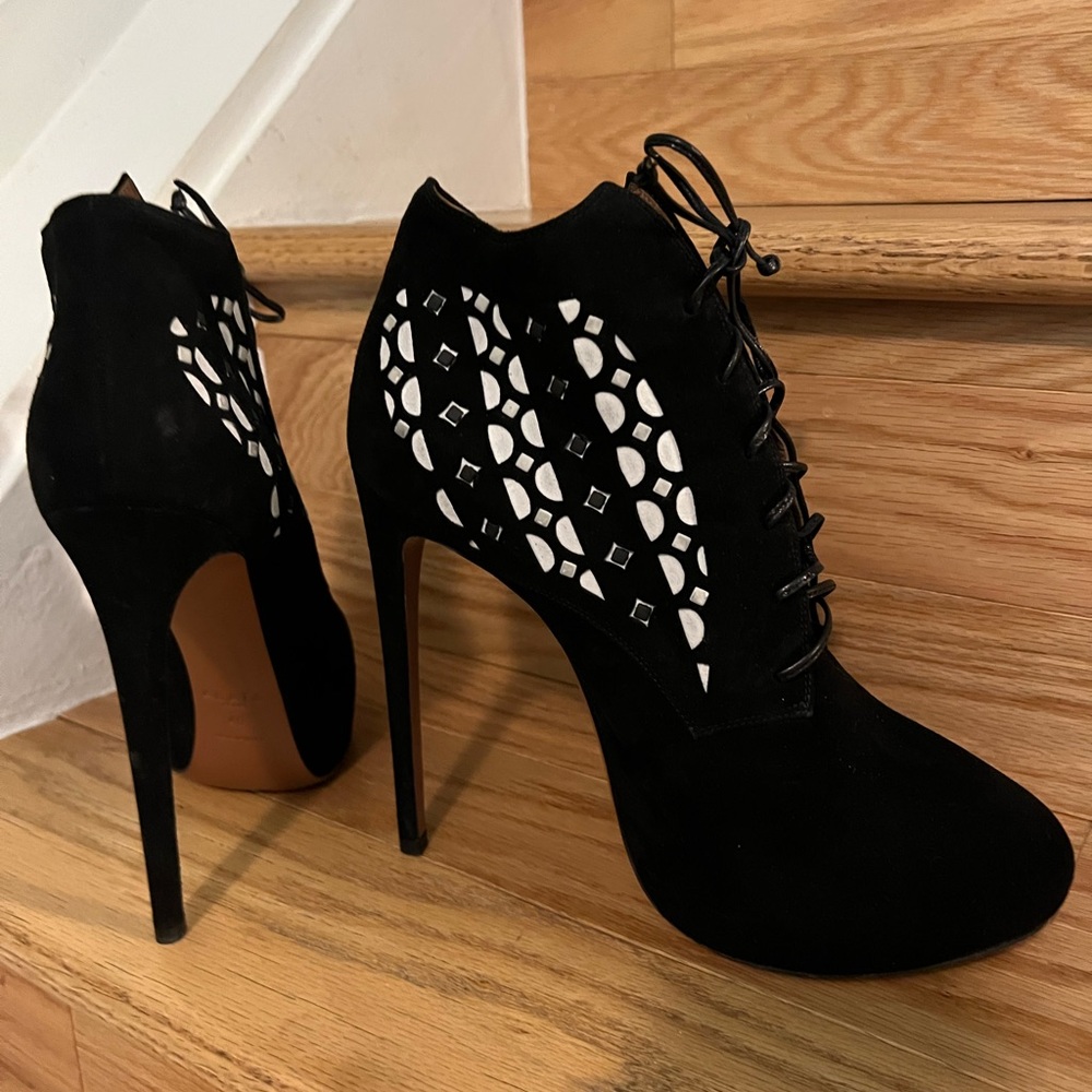 Alaia Black Lace-Up Heels with White Cutout Design